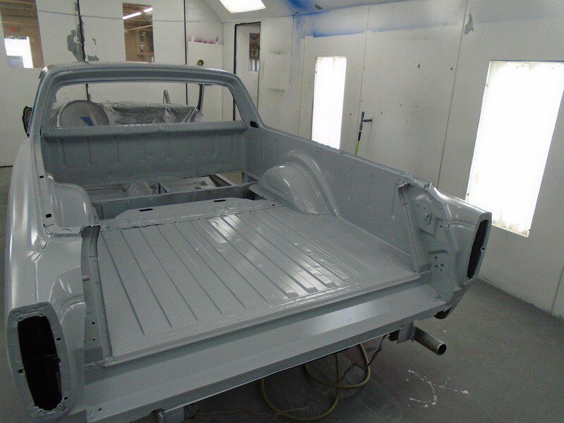 Grey primered vintage truck bed.