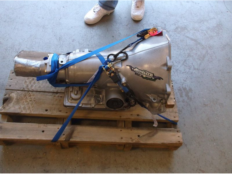 Monster transmission secured on pallet.