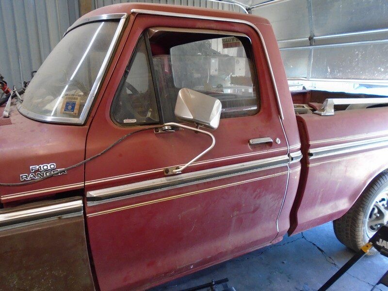 Red Ford F100 Ranger pickup truck.