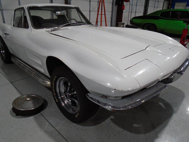 White 1963 Corvette Sting Ray coupe.