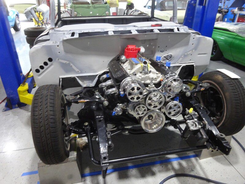 Polished accessory pulleys on installed V8 engine