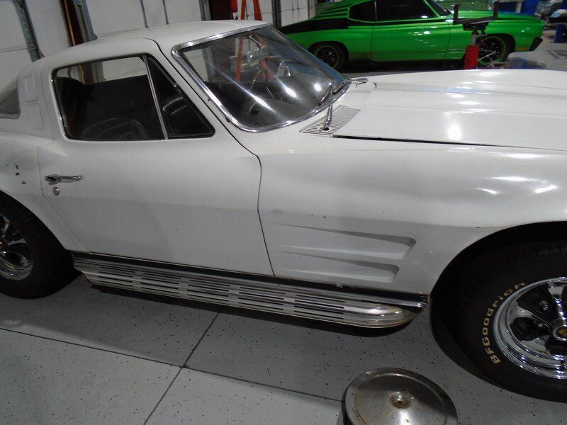 White 1963 Corvette Sting Ray side view.