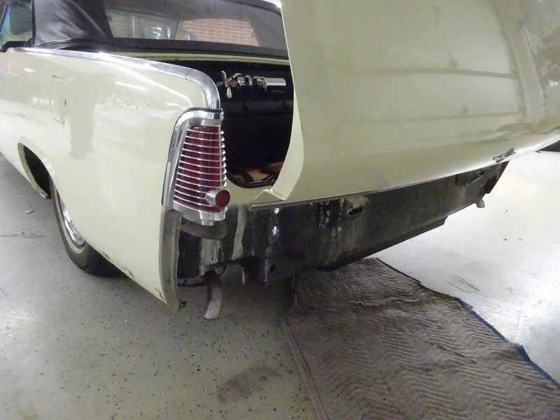 Classic convertible car rear end damage.