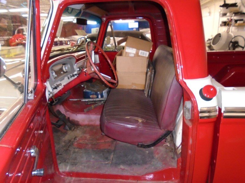 Red vintage truck cab interior.