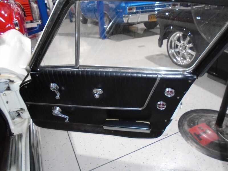Classic car's interior door panel detail.