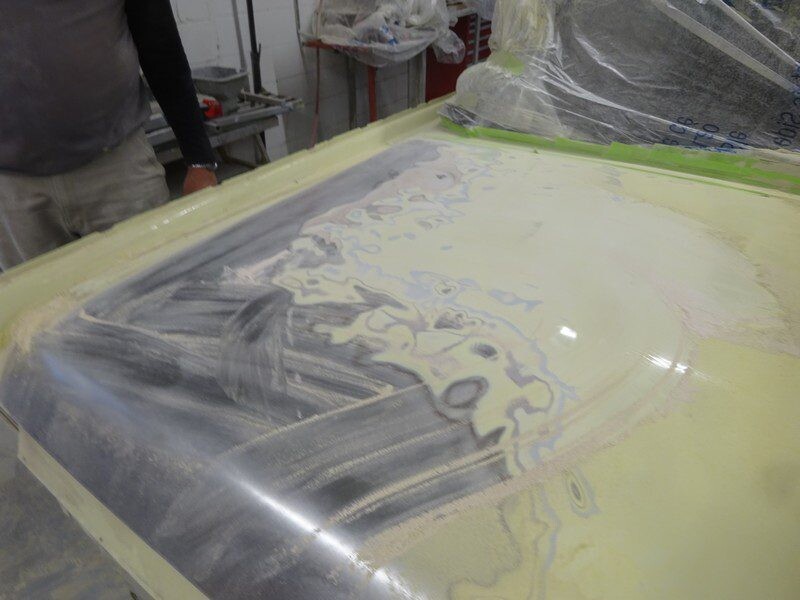 Car body in progress, primer coat.