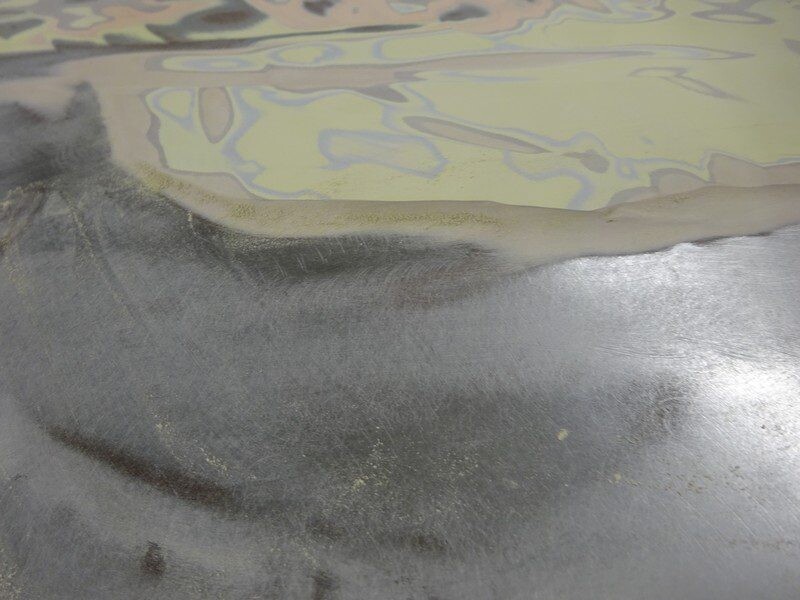 Car body repair, sanded surface.