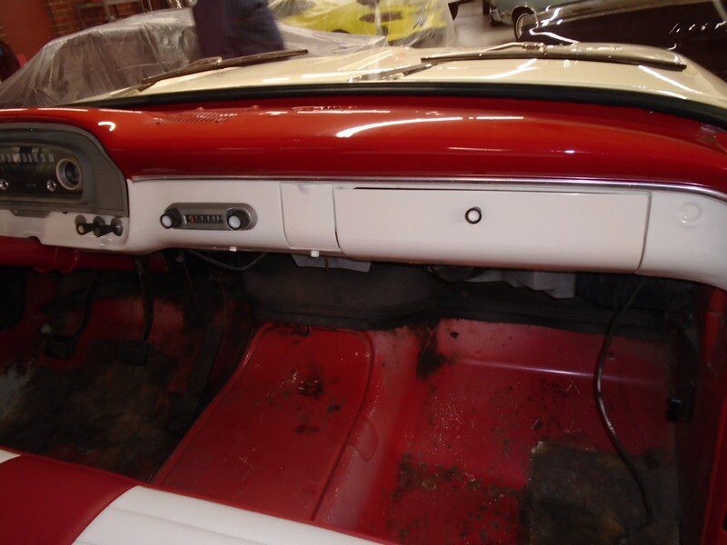 Red and white vintage car interior.