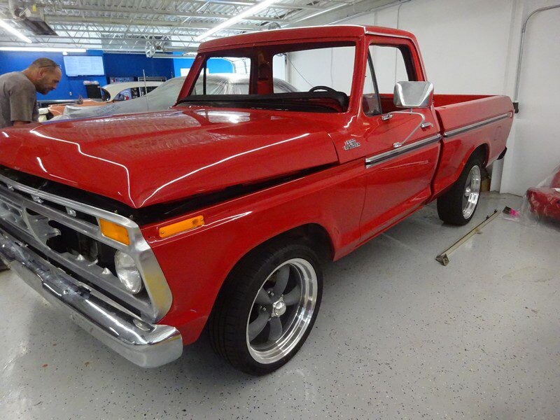 Red Ford F-100 pickup truck restoration.