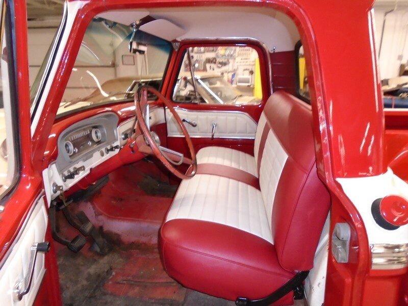 Red and white vintage truck interior.