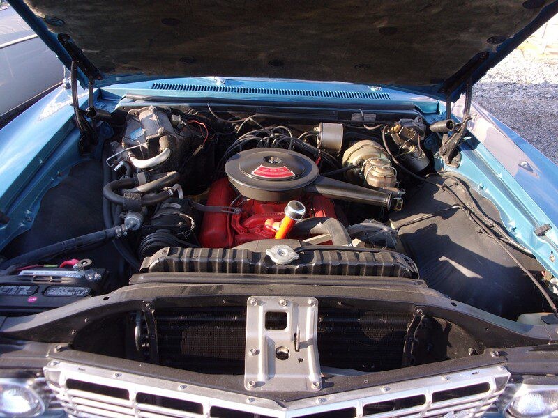 Red engine block with black air cleaner