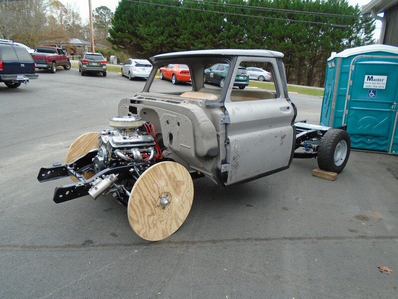 Image of car engine connected with wood