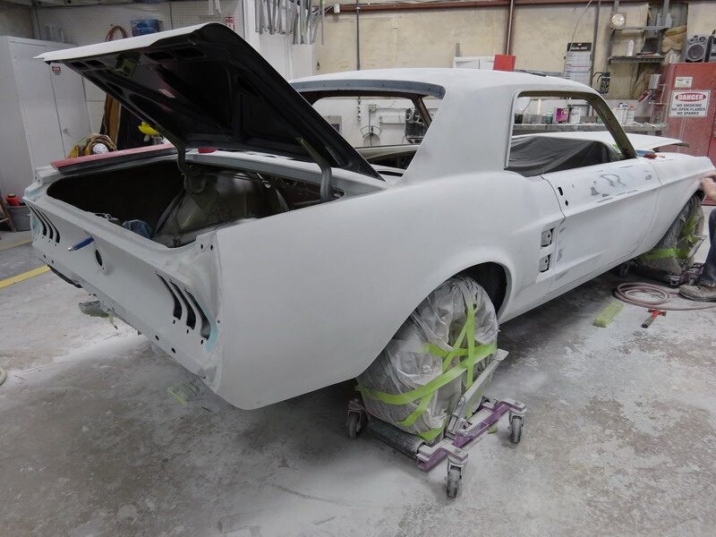 Primered Ford Mustang restoration project.