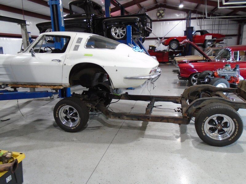 White Corvette restoration in progress.