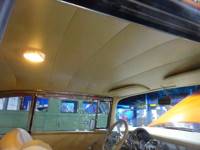 Beige car headliner interior view.