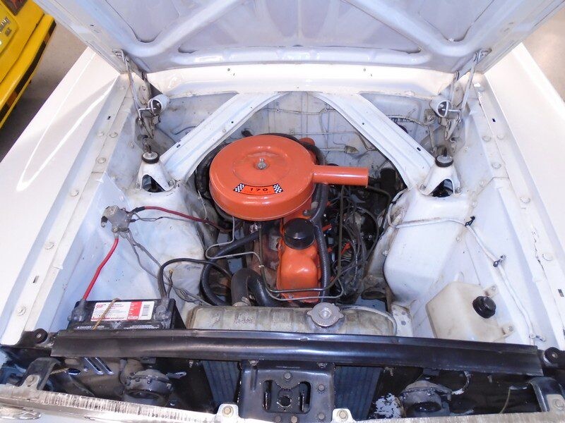 White classic car engine bay.