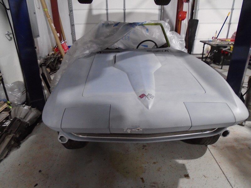 Gray primered Corvette Stingray restoration.