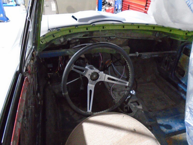 Spartan steering wheel over bare metal floor