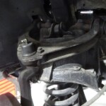Car's front suspension and coil spring.