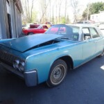 Blue color car on the display of the website