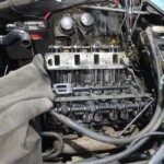Car engine undergoing repairs.