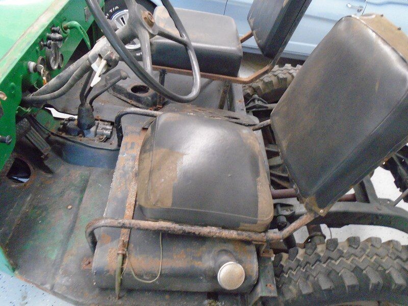 Rusty Jeep seats and steering wheel.